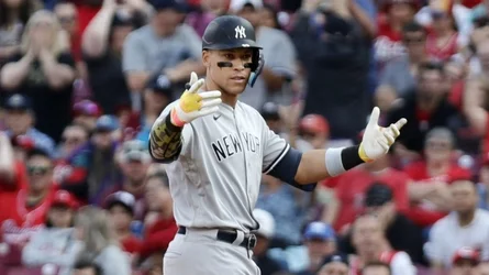 "Judge and Rizzo lead Yankees to victory over Reds in extra innings"