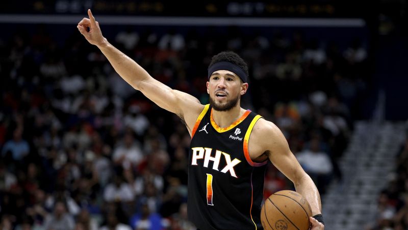 "Devin Booker's 52-Point Performance Lifts Suns Over Pelicans in Historic Win"