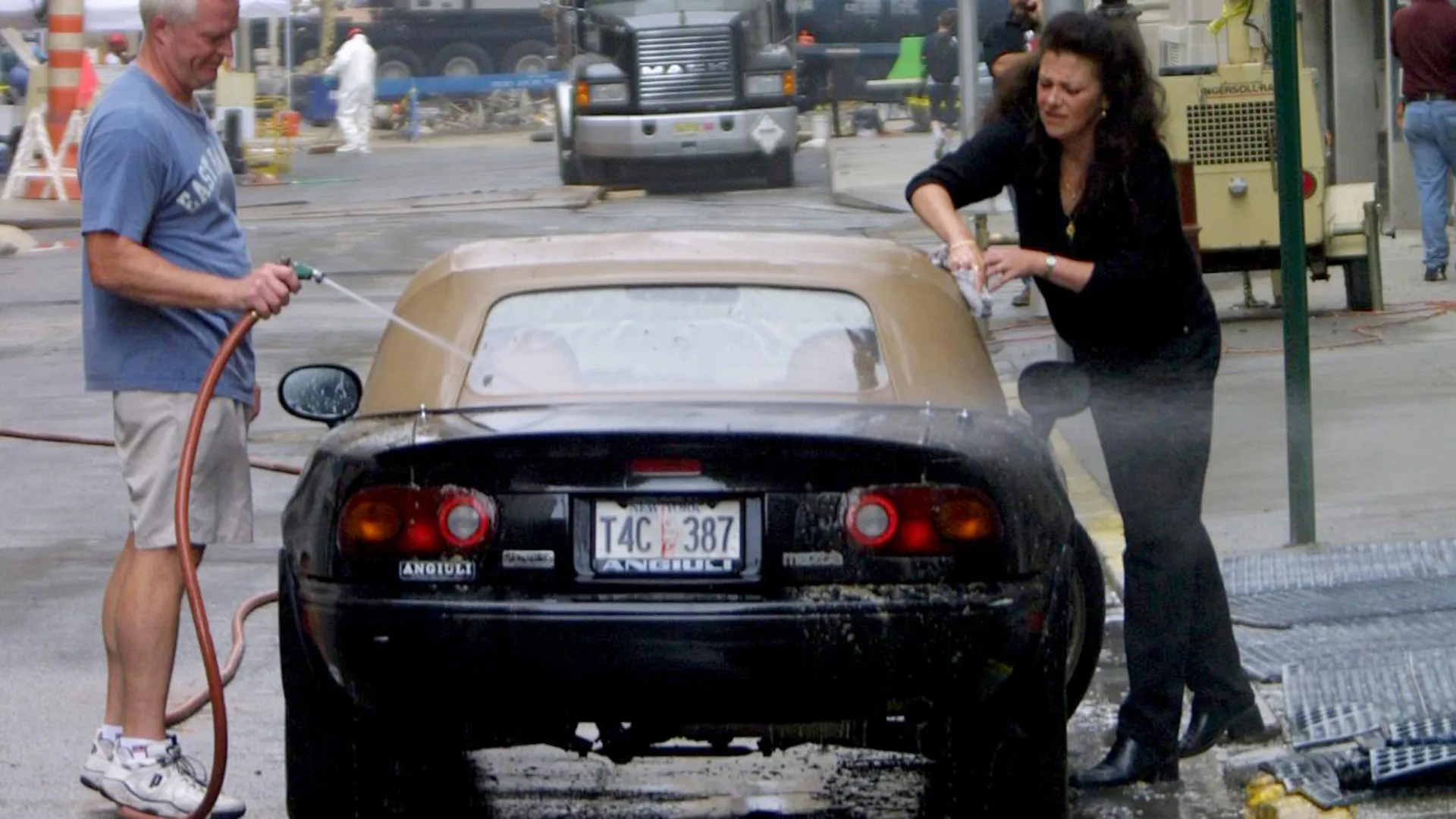Featured image for Two People Wash Their Miata Near Ground Zero