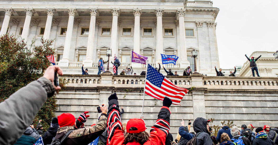 Featured image for "Brooklyn Anti-Vaccine Protester Charged with Assaulting Police Officers During Jan. 6 Riot"
