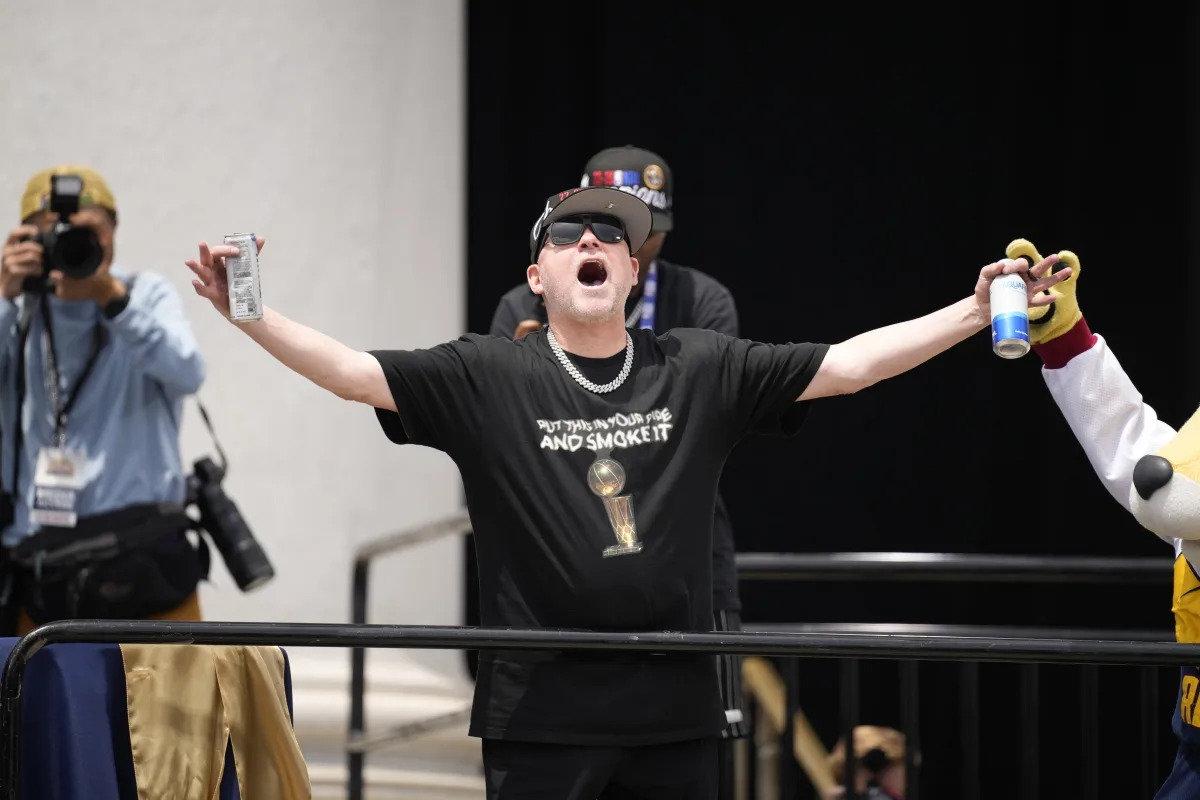 Featured image for Nuggets Coach Michael Malone Gets Championship Tattoo.