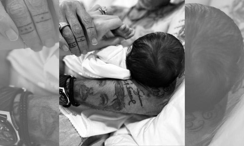 Featured image for Marc Anthony and Nadia Ferreira welcome their first child together.