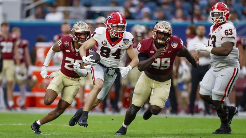 Featured image for "Georgia's Dominance Over Undefeated FSU Sparks Debate on College Football Playoff Exclusions"