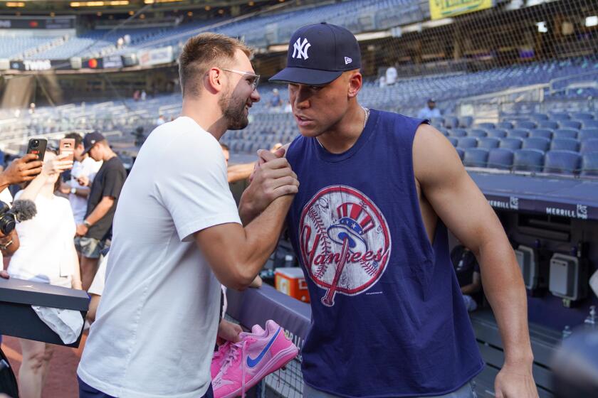 Featured image for Luka Doncic Criticizes Mavericks Amidst Revenge Body Reveal