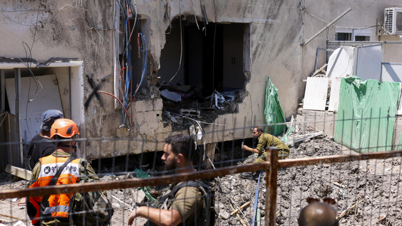 Israel-Iran Conflict Escalates with Revolutionary Guard Losses and Nuclear Facility Attack