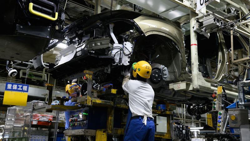 "Revised Data Shows Japan Avoids Recession, Economy Grows"