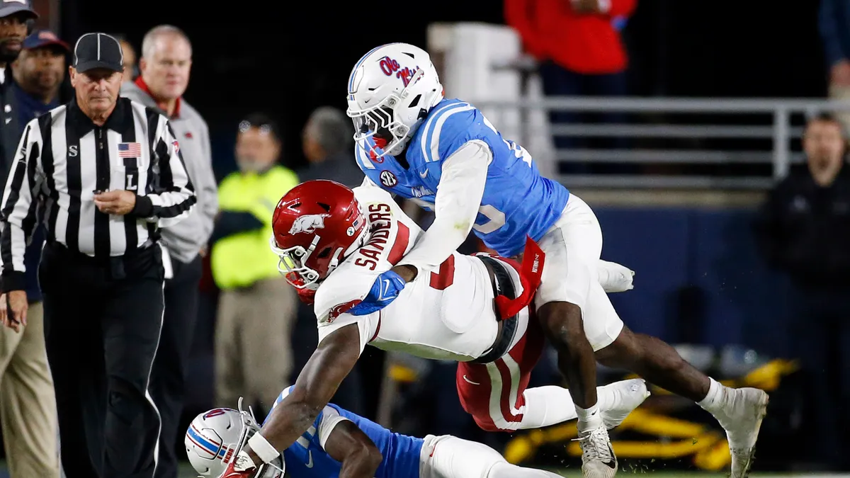 Ole Miss narrowly escapes Arkansas upset with late offensive surge