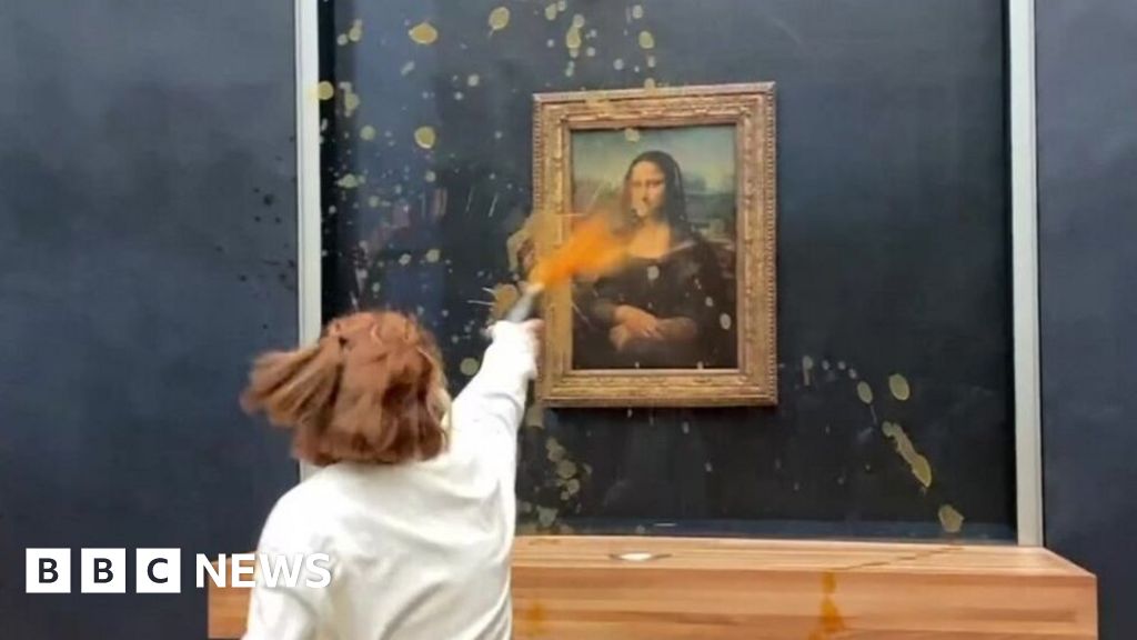 Featured image for Soup-Throwing Protesters Target Mona Lisa at Louvre