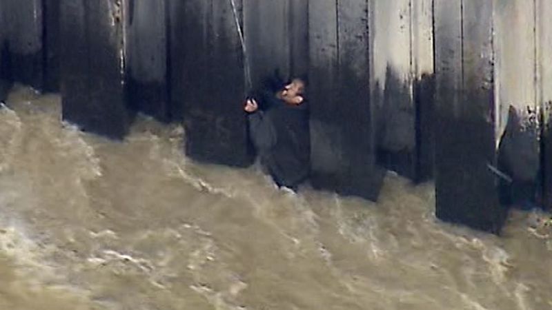 Dramatic Rescue: Man Saved from Raging LA River by Helicopter