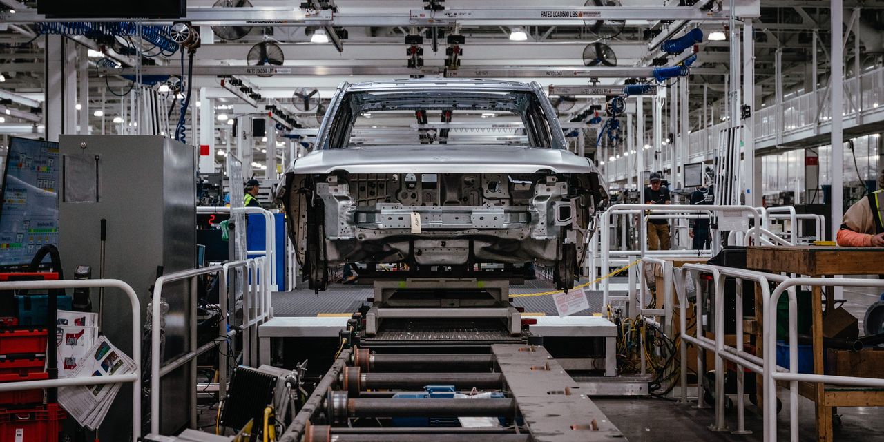 Rivian boosts production by relocating engineers near Illinois factory.