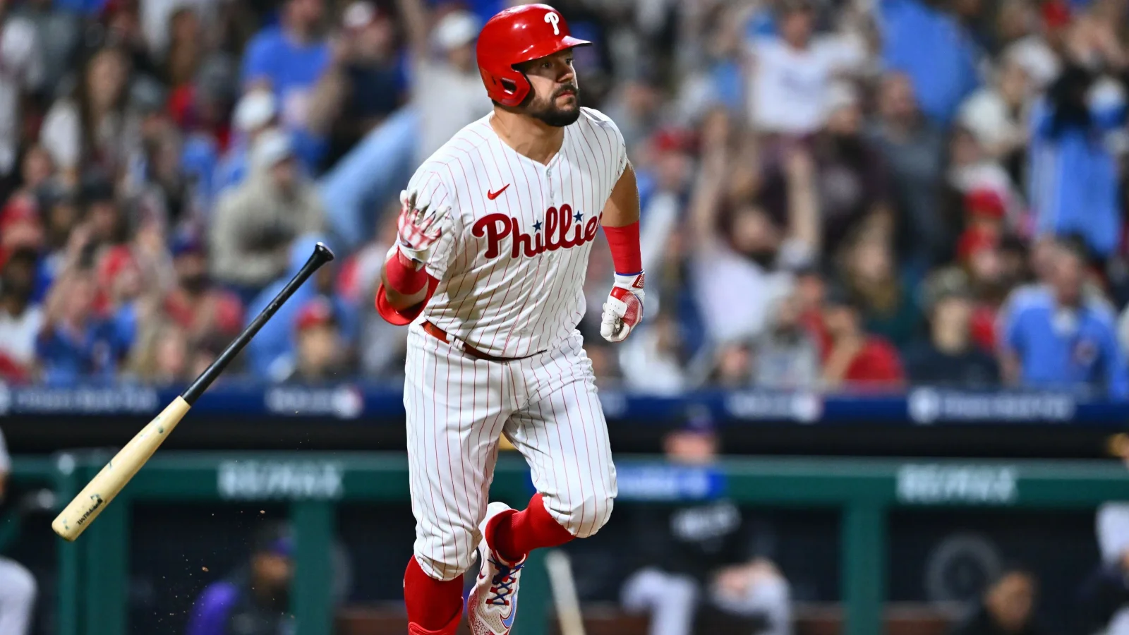 Phillies secure victory against Rockies with clutch hits and team effort.