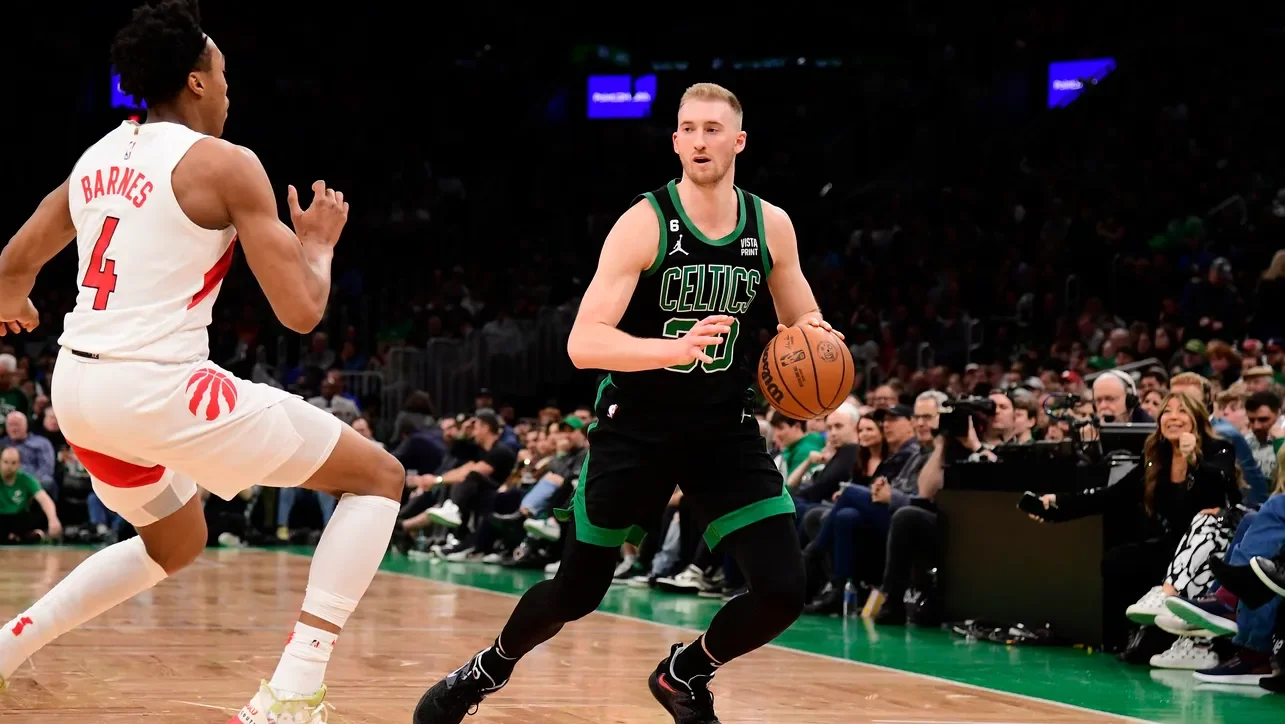 Sam Hauser shines in Celtics' dominant win over Raptors.