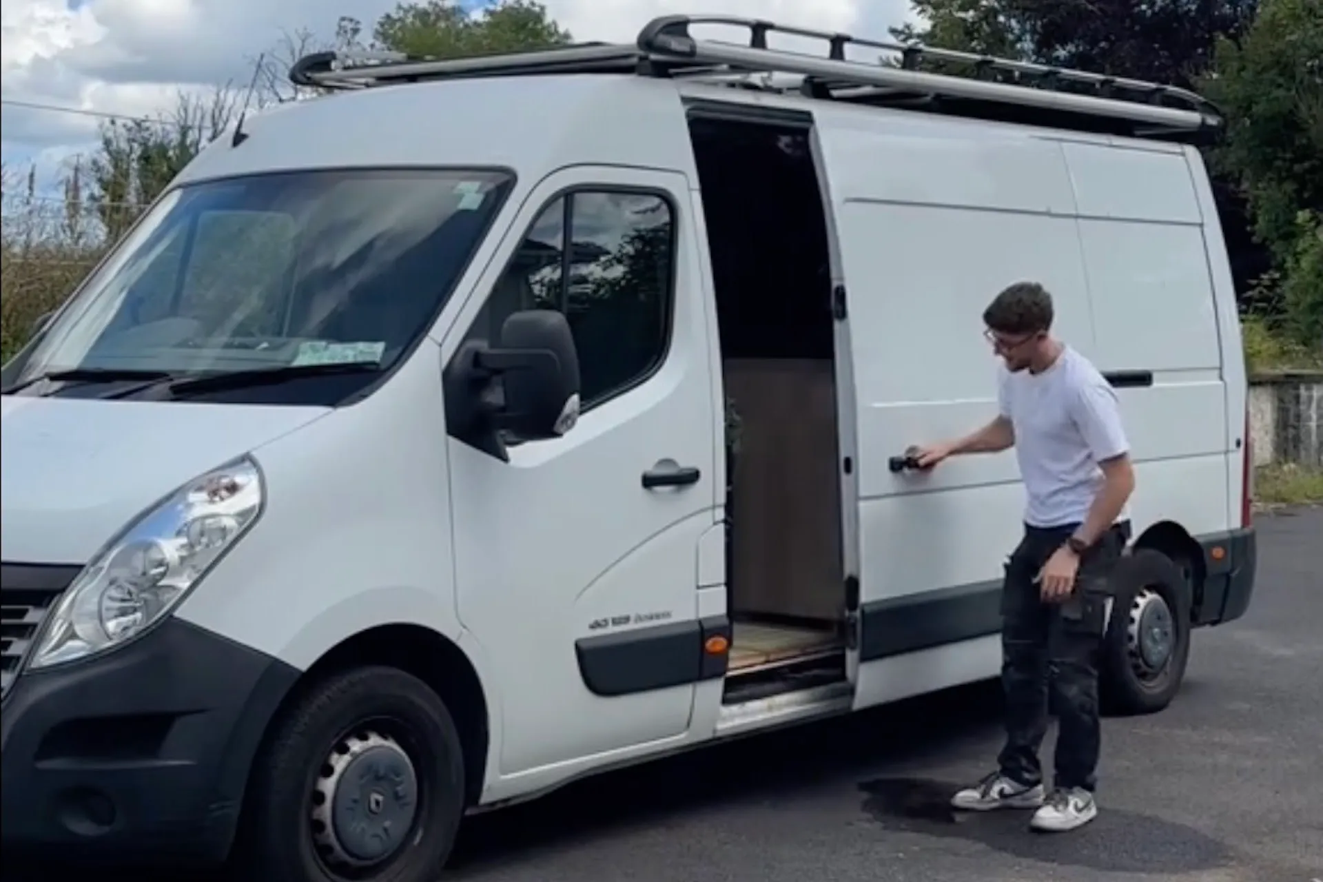Featured image for Man Converts Van into Stunning Tiny Home on Wheels