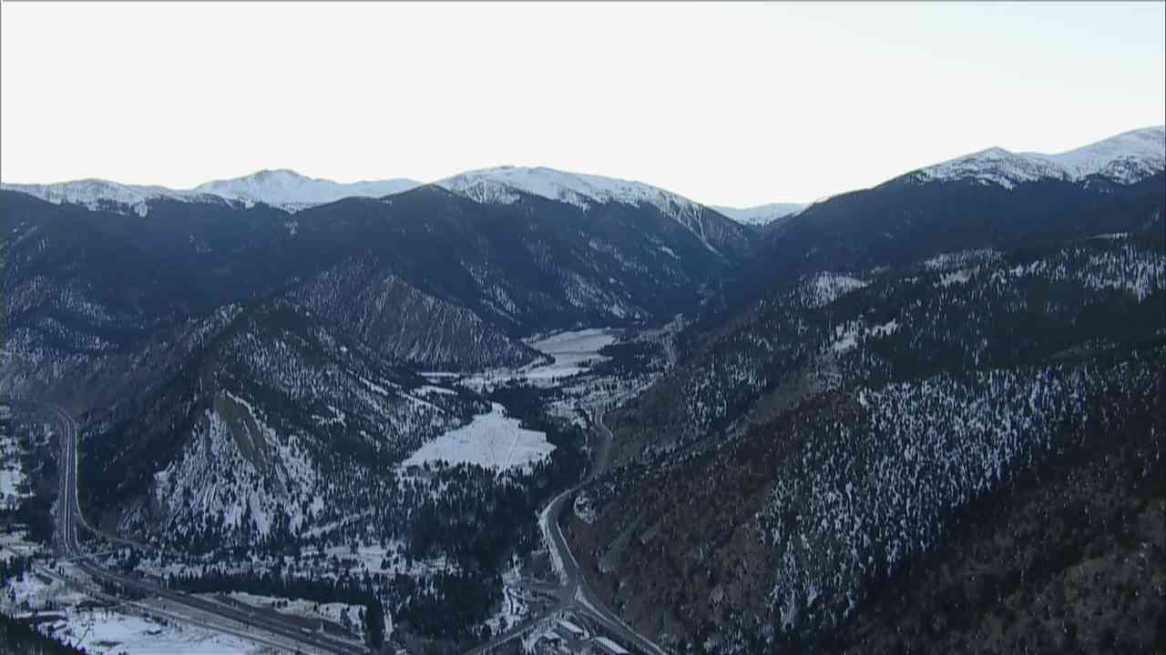 "Colorado Rockies Hit by Snowstorm, Causing Travel Disruptions"