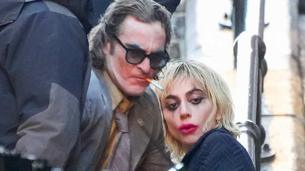 Featured image for Lady Gaga Joins Joaquin Phoenix on Set of Joker 2, Sings and Dances on Bronx Stairs.