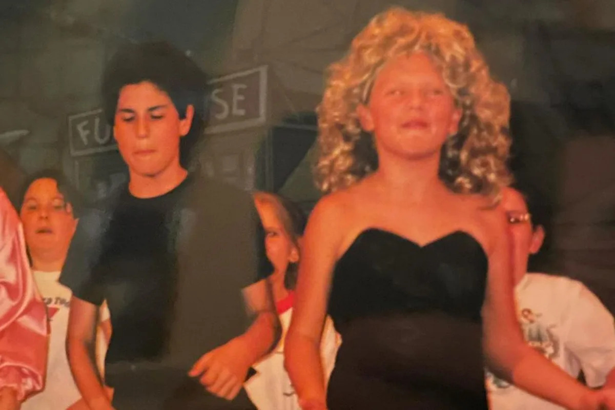 Featured image for "Taylor Swift's Childhood Co-Star Shares Throwback 'Grease' Pics of Young Sandy"