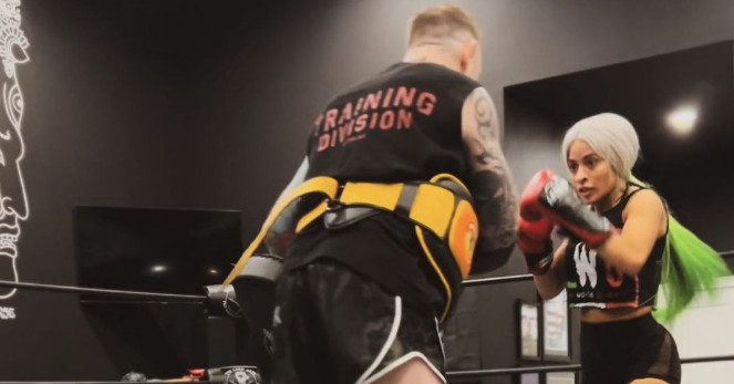 Featured image for "Social Media Highlights: Steve Austin's Surprising Singing Skills and Zelina Vega's Impressive Kickboxing Moves!"