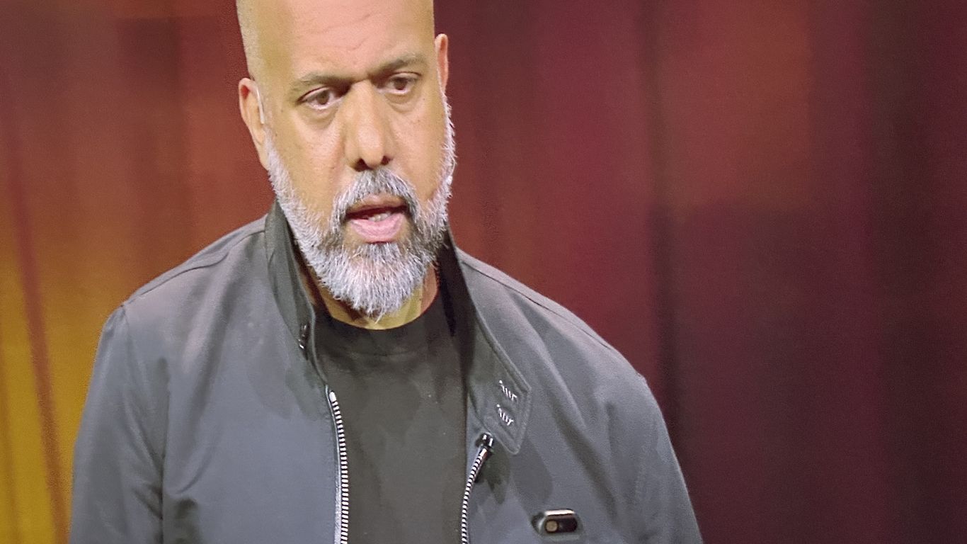 Featured image for Humane unveils innovative AI-powered combadge wearable with projected screen.