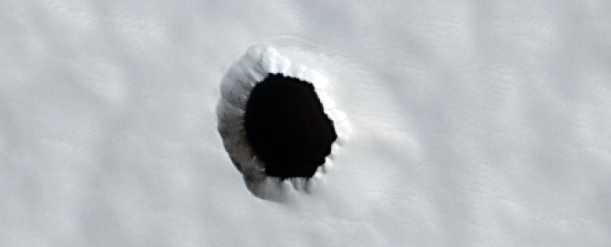 Featured image for Mysterious Hole on Mars Baffles Scientists