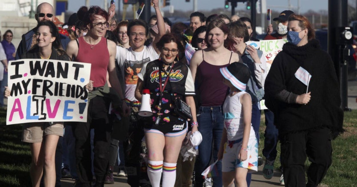 Kansas enacts invasive transgender sports ban despite governor's veto.