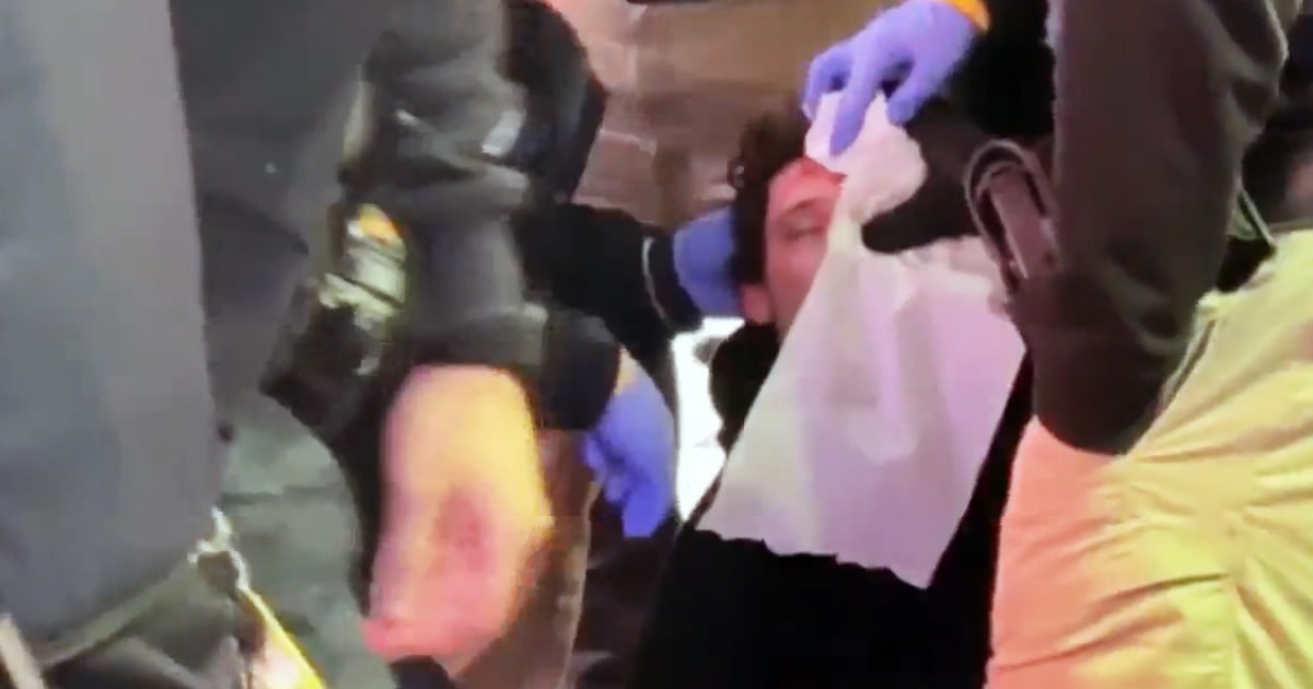 "Manhunt underway for 18 suspects in Times Square attacks"