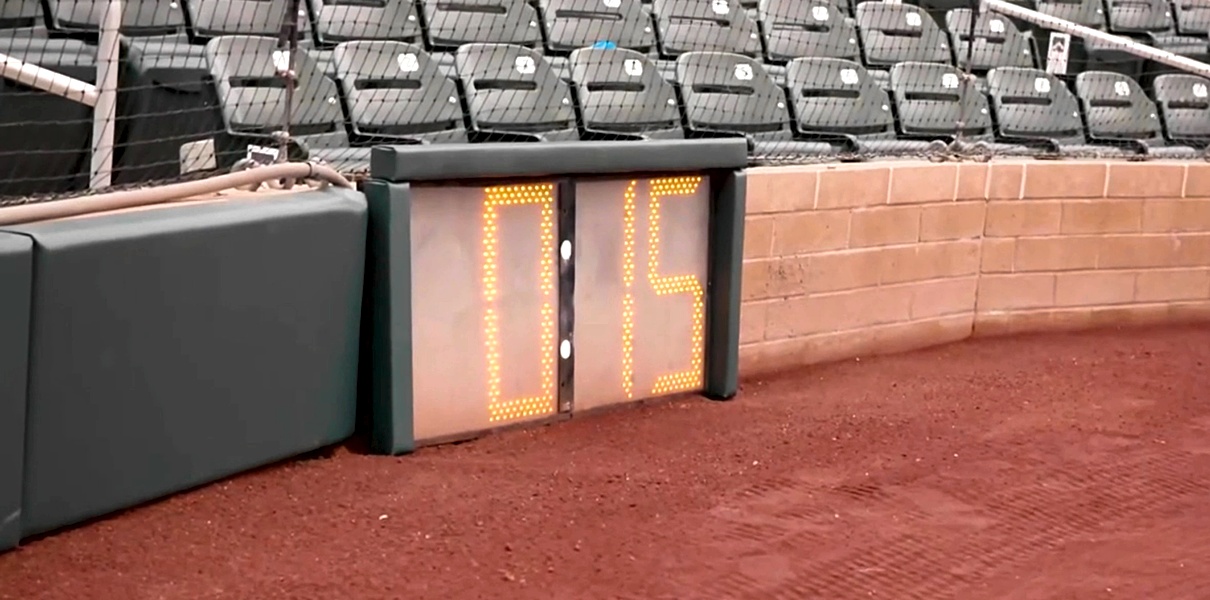 MLB's New Rules: Impact on Games, Pitch Clock Sacrifices Memorable Moments, and Eight Key Numbers.