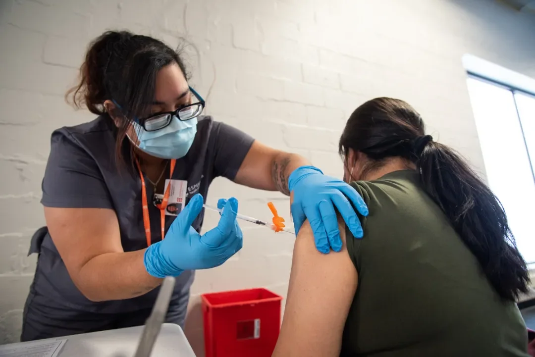 "Chicago Prepares for Fall Booster as School Year Begins Amid COVID Surge"