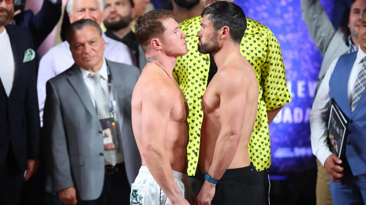 Canelo Alvarez defeats John Ryder in boxing match.