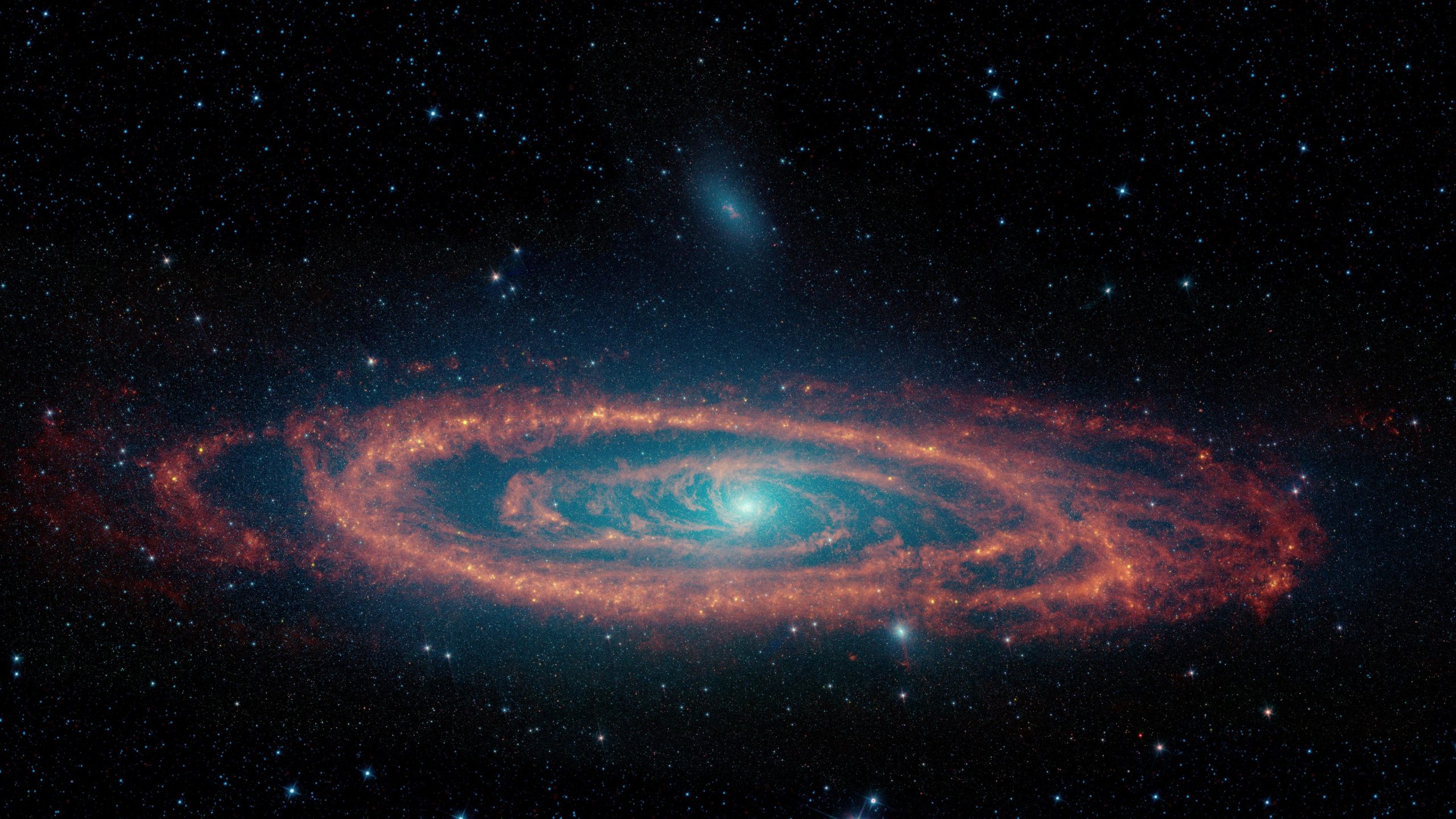 Featured image for NASA's Spitzer Unveils Andromeda's Black Hole Feeding Patterns