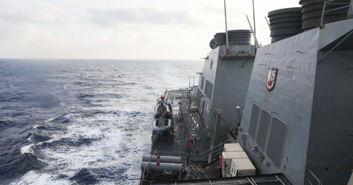 Tensions rise as US warship challenges China's South China Sea claims.