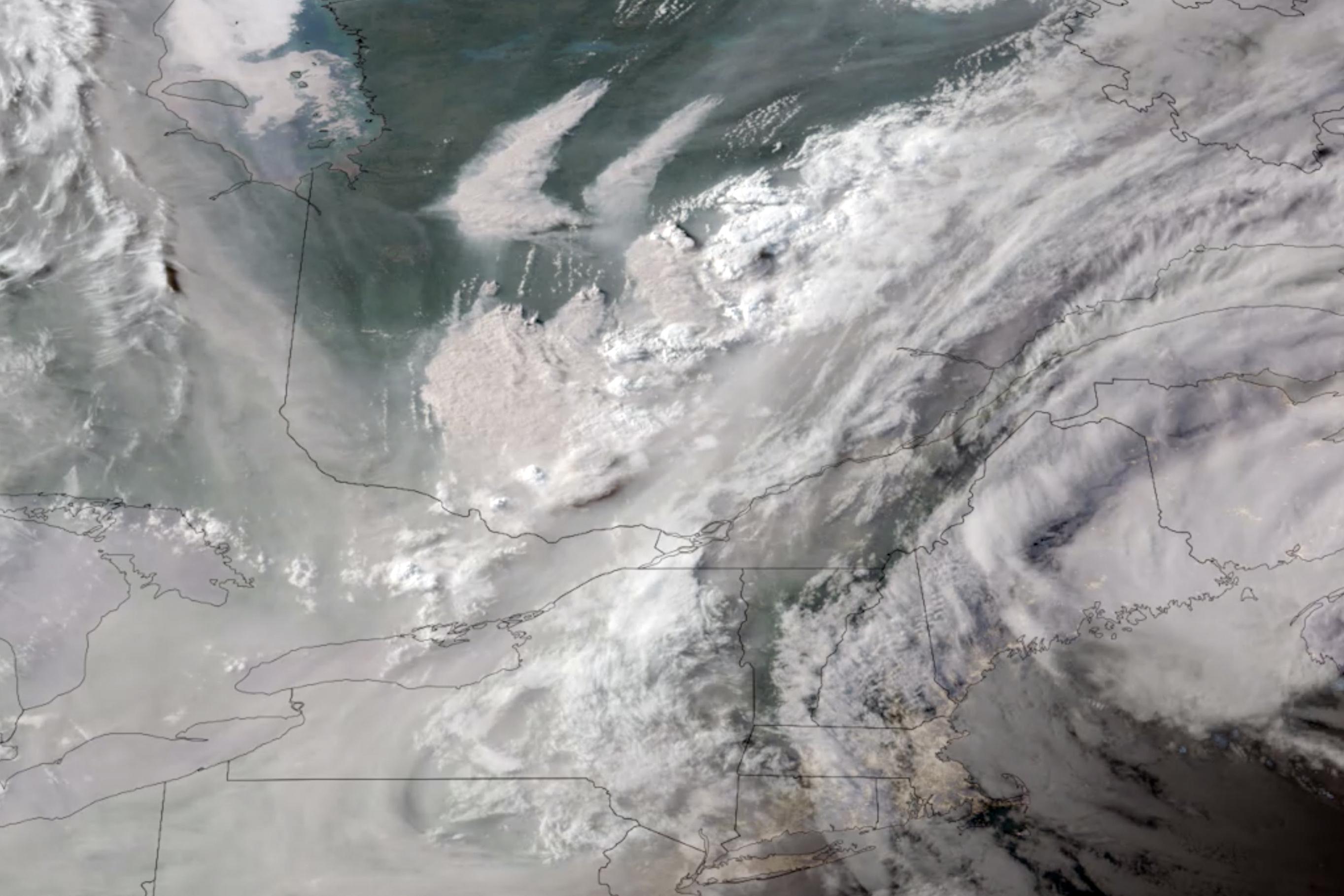 Canada's Wildfires Continue to Rage, Forcing More Evacuations in Quebec