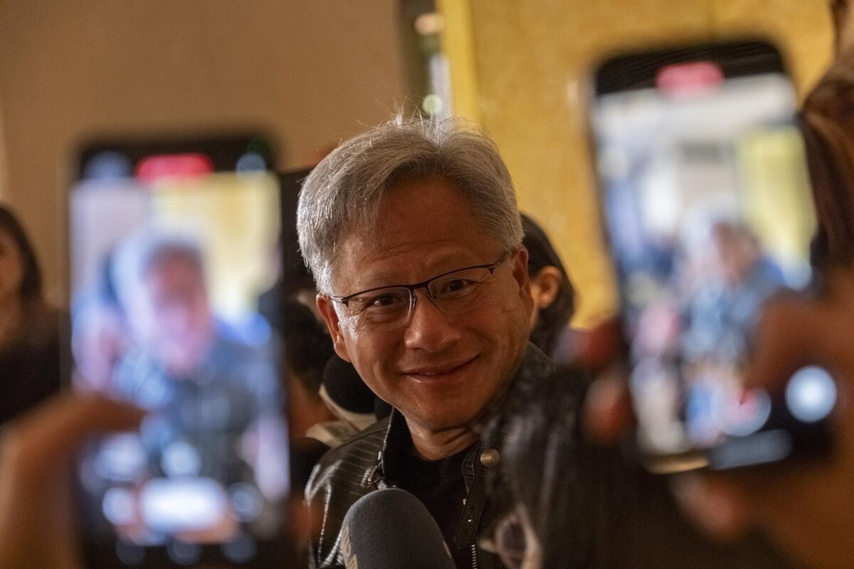 "Nvidia CEO Advocates Affordable AI Development Amidst Cost Concerns"