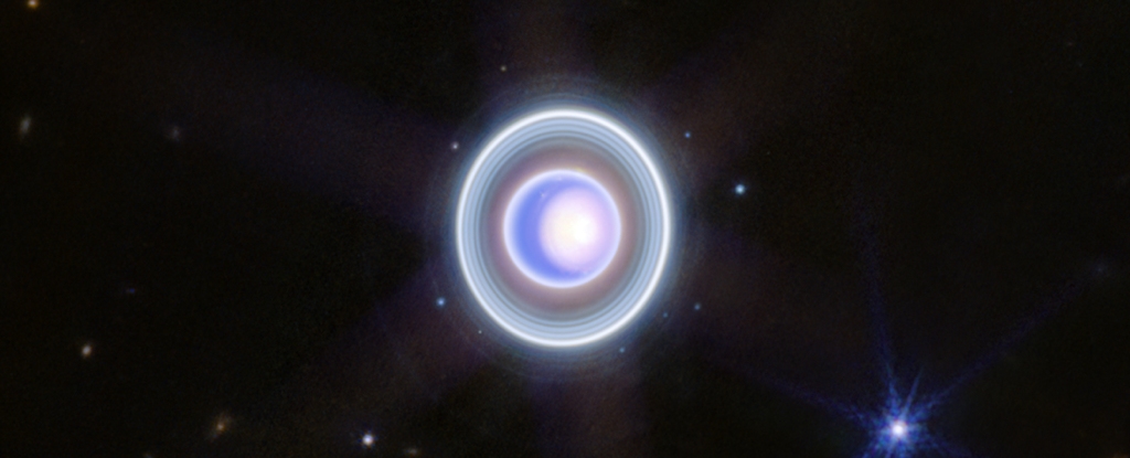 "Discovery of Three Tiny Moons Orbiting Neptune and Uranus"