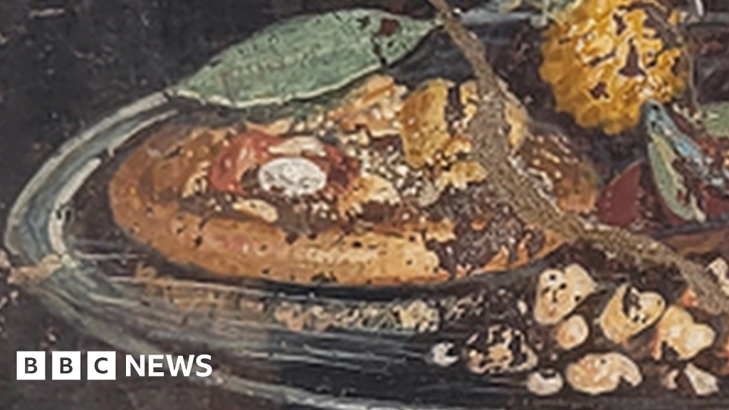 Archaeologists uncover ancient fresco depicting possible pizza ancestor in Pompeii.