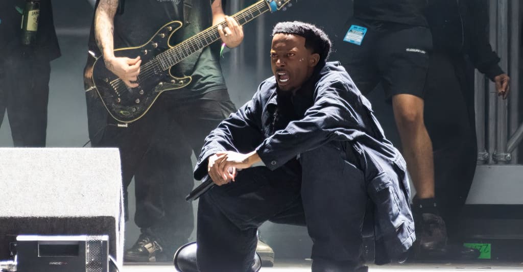 Featured image for "Playboi Carti and Travis Scott Ignite 2024 with "BACKR00MS" Collab and New Music Teases"