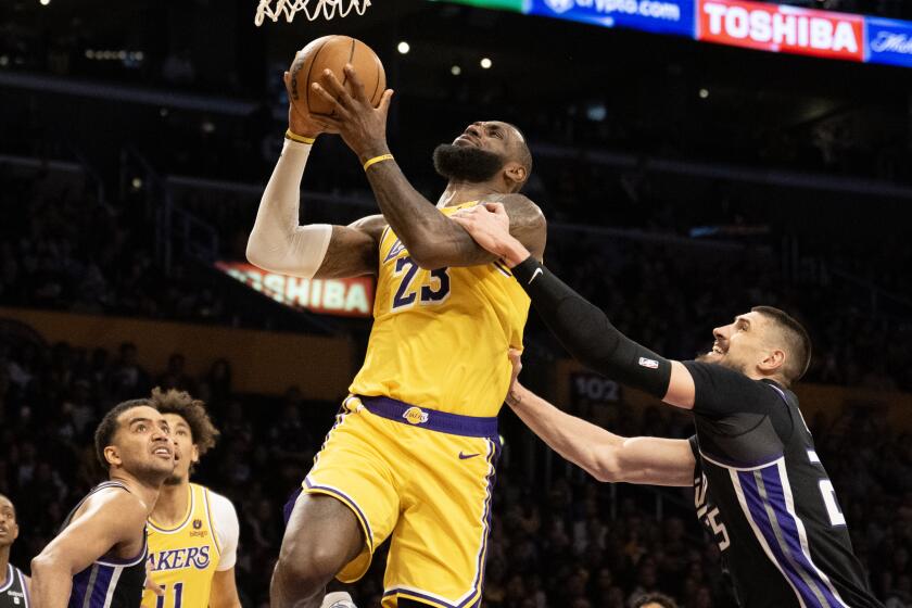 "LeBron James' Early Exit Leads to Lakers' Collapse Against Kings"