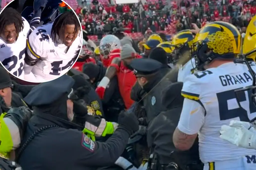Featured image for Ohio State-Michigan Brawl Sparks Controversy Over Pepper Spray Use and Coaching Tensions