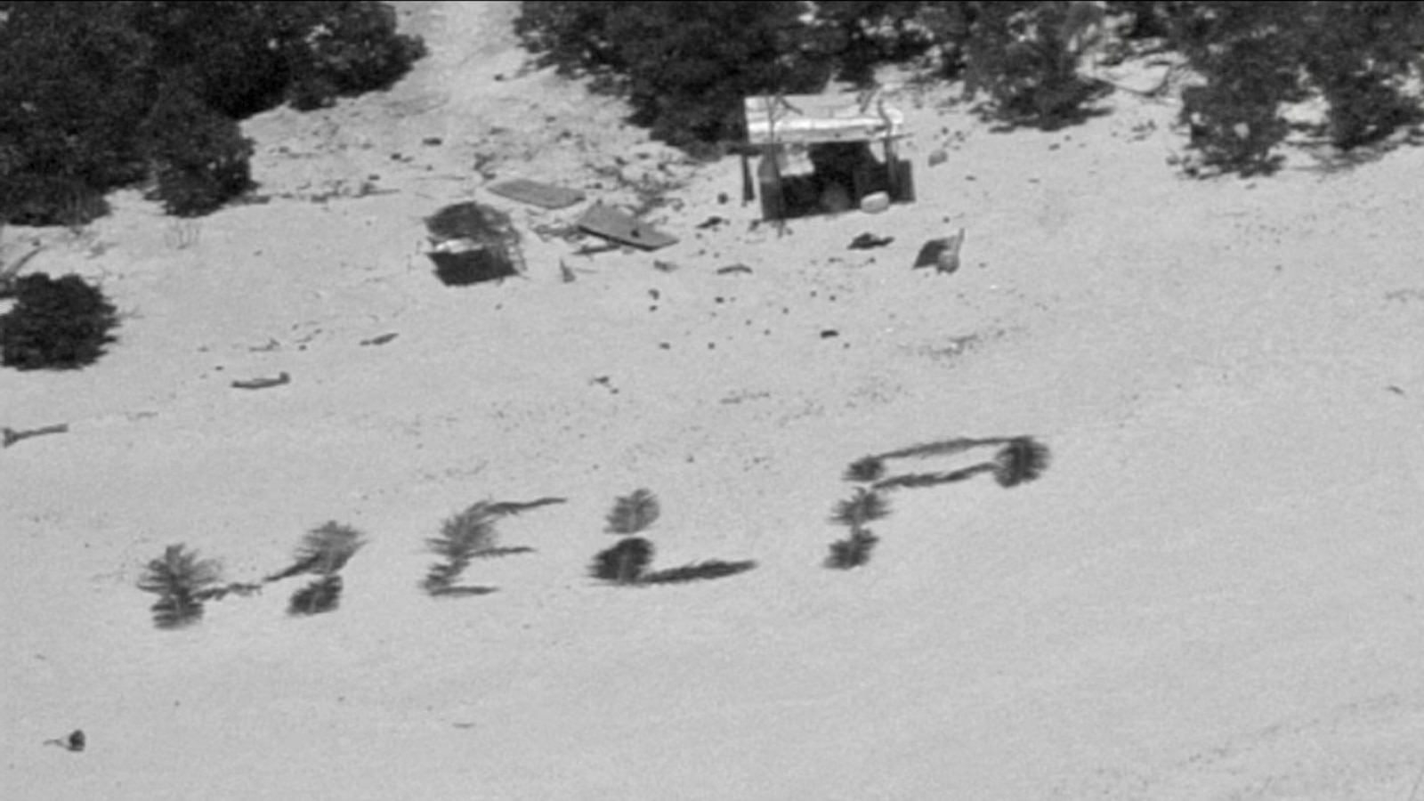 Featured image for "3 Men Rescued from Remote Pacific Island Using 'Help' Sign"