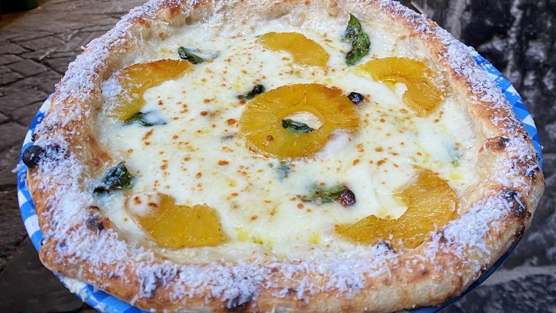 "Italian Culinary Clash: Pineapple Pizza Sparks Nationwide Debate"