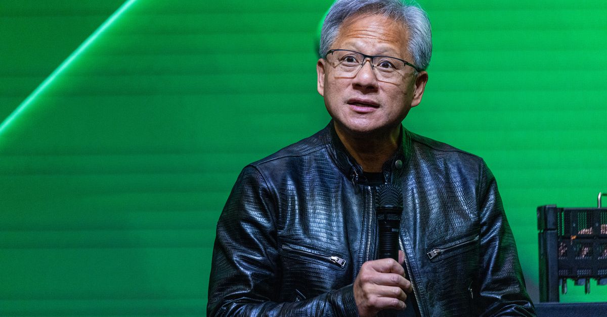 Featured image for "Nvidia CEO Jensen Huang Signs Fan's Chest"