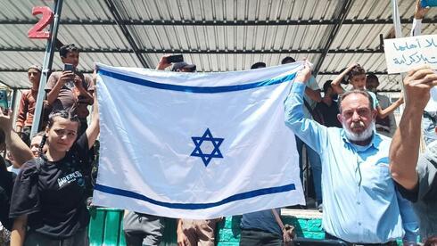 Featured image for Thousands in Sweida protest regime, wave Israeli flags amid escalating conflict and aid efforts