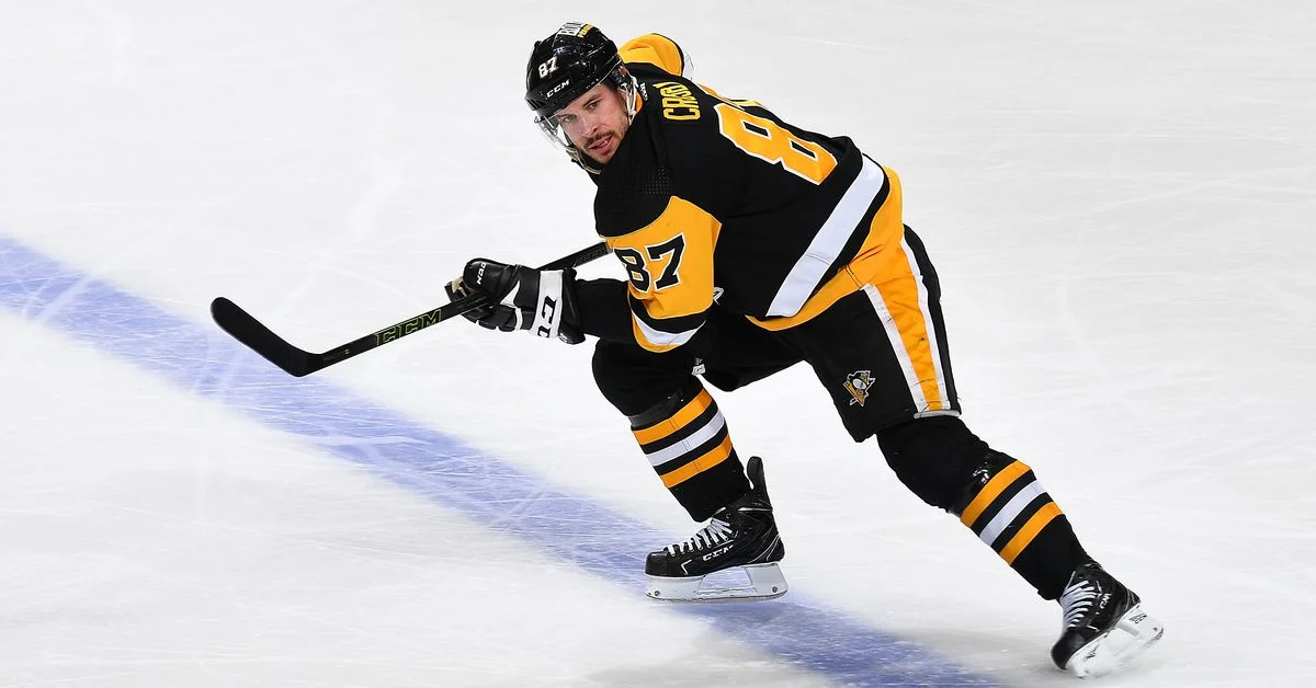 Crosby leads Penguins to victory over Avalanche with Carter's help.