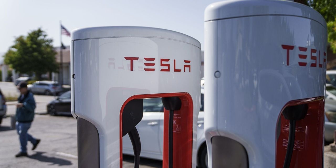 Featured image for Rivian Joins Tesla's Supercharger Network, Shares Surge