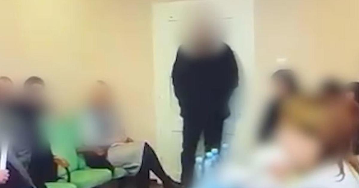 Featured image for "Shocking Video: Ukraine Councilor's Grenade Attack Injures 26 at Meeting"