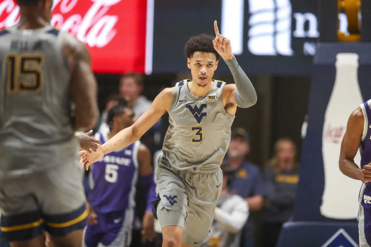 Featured image for Kentucky lands West Virginia transfer Tre Mitchell while Alabama reaches out to Big-12 transfer.