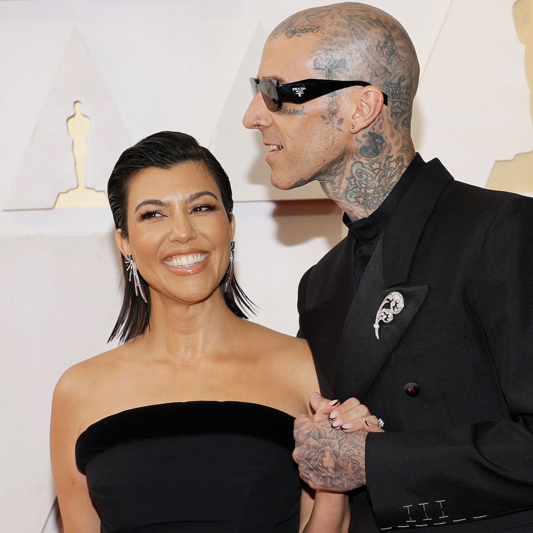 "Travis Barker's Sweet Kiss to Kourtney Kardashian's Growing Baby Bump"
