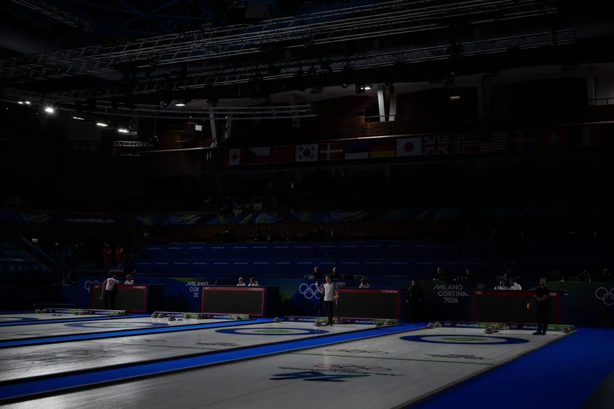 Lights-out delay halts Olympic curling opener in Cortina