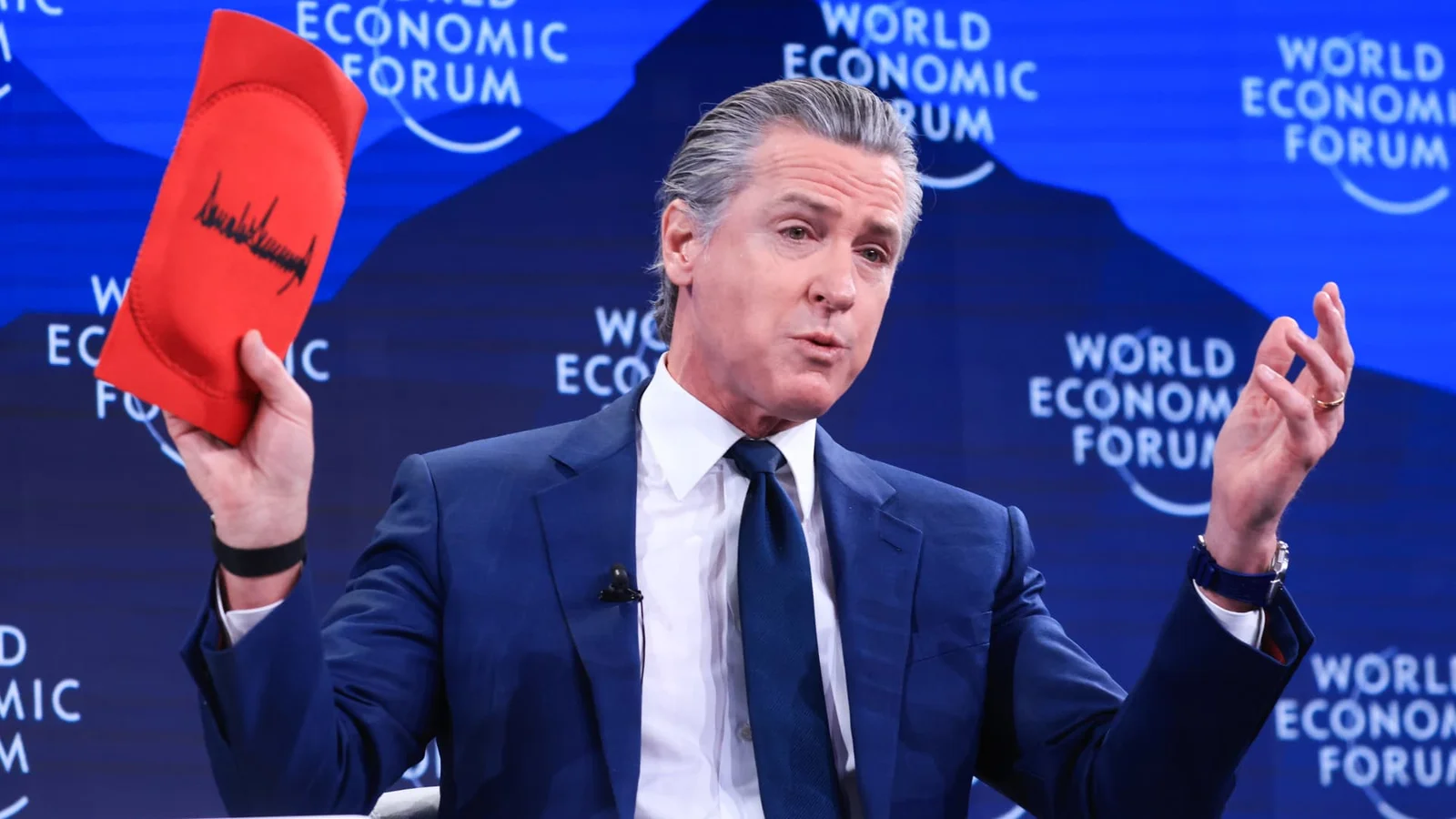 Newsom hawks Trump-branded knee pads to mock corporate leaders at Davos