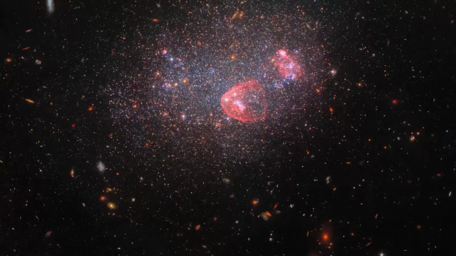 "Hubble Telescope Captures Stunning Images of Dwarf and Massive Galaxies"