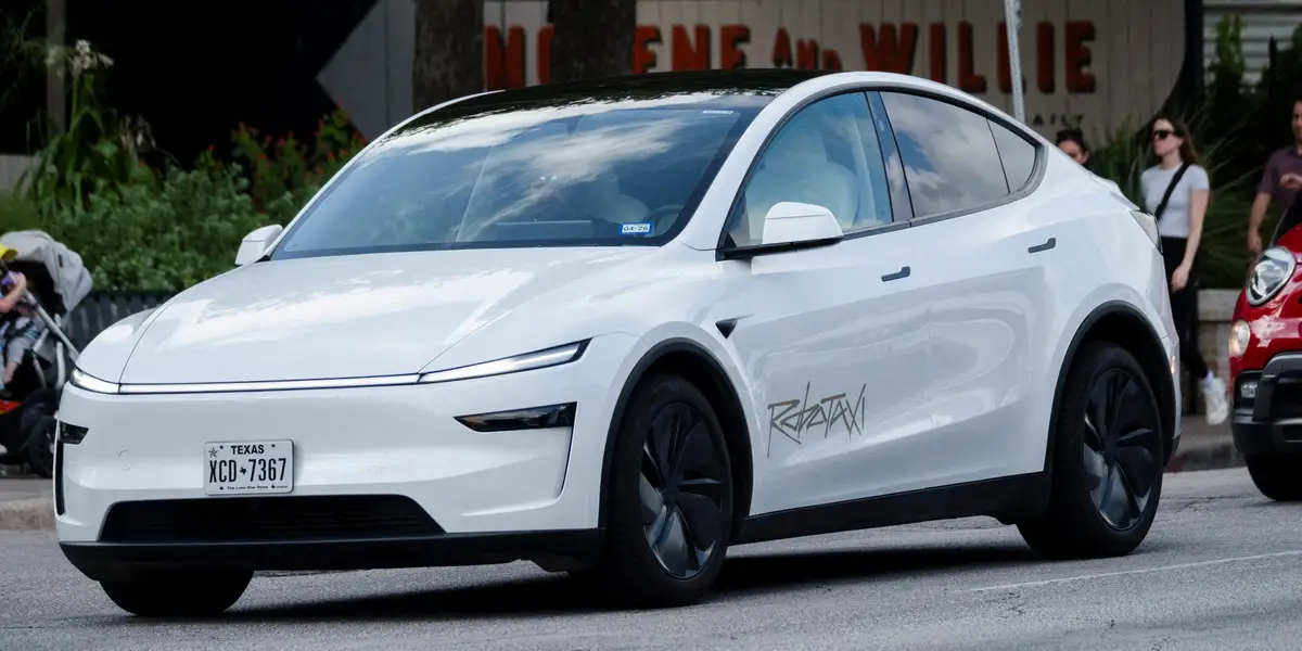 Tesla's Robotaxi Launch Sparks Regulatory and Market Debate